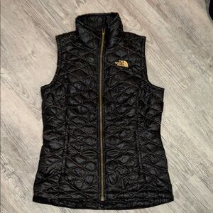 The North Face Women's Black Quilted Vest with Gold Accents